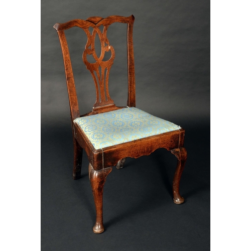 1586 - A George III Provincial Chippendale elm side chair, cupid bow cresting rail, shaped and pierced spla... 