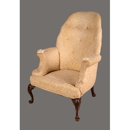 1587 - A George I design armchair, stuffed-over upholstery, cabriole legs carved to the knees with scrolls,... 