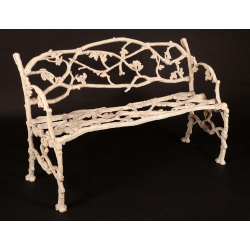 1604 - A Victorian cast iron garden bench, attributed to Coalbrookdale, cast throughout with scrolling vine... 