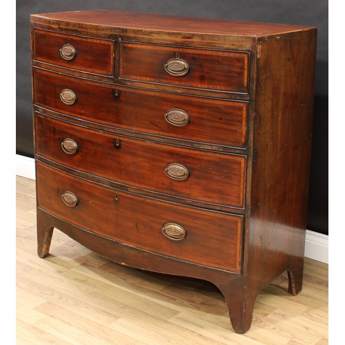 139 - A George IV mahogany bow-fronted chest, of two short and three long graduated cockbeaded drawers, ov... 