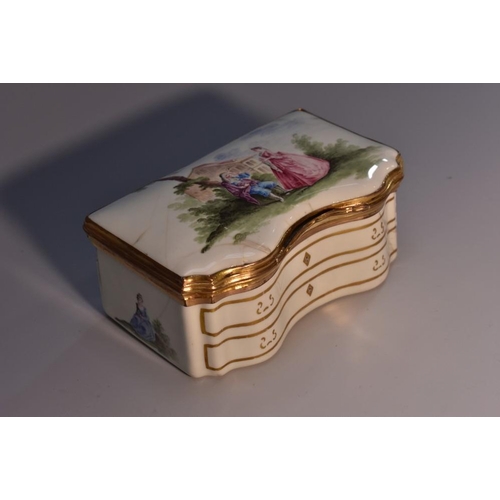 1796 - An 18th century enamel novelty table snuff box, as a serpentine fronted commode, hinged cover painte... 