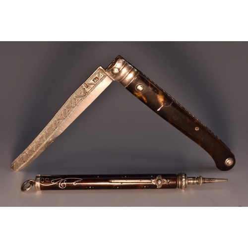 1802 - An early Victorian tortoiseshell and silver pique propelling pencil, 7cm long, dated 1840; a George ... 