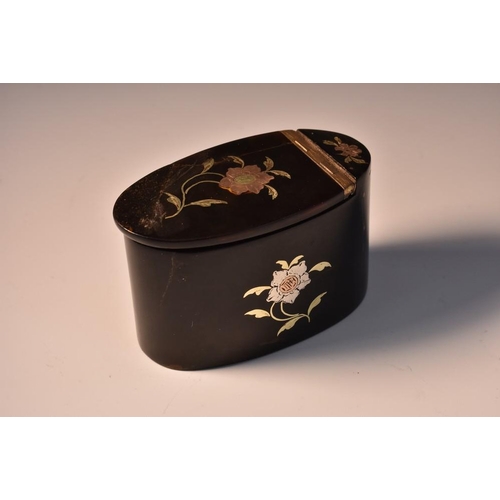 1814 - A George III tortoiseshell and piqué oval snuff box, inlaid throughout with sprigs of country flower... 