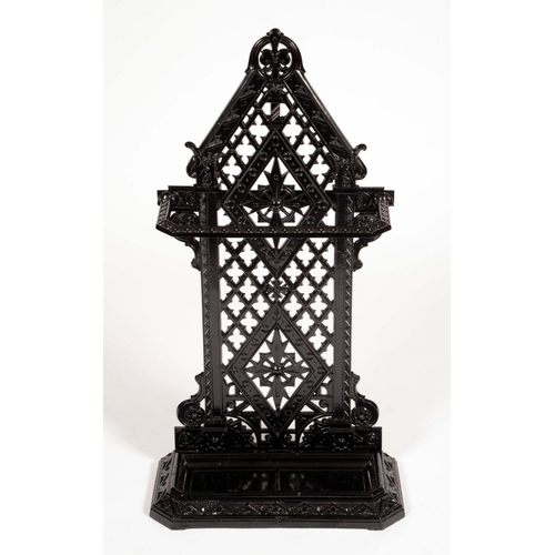 1864 - A Victorian Aesthetic Movement cast iron umbrella stand, shaped arched back pierced with tracery, ca... 