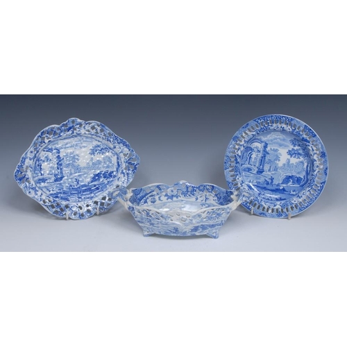 67 - A Spode Italian pattern shaped two handled basket and oval stand, in relief with basketwork, pierced... 