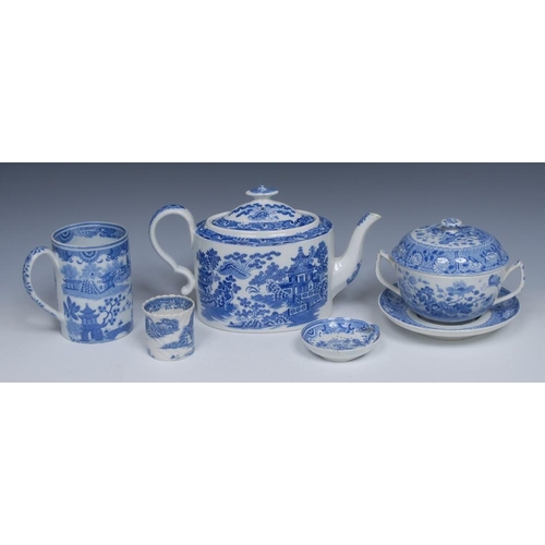 79 - A Spode Willow pattern teapot and cover, transfer printed in tones of blue with fence, pagoda, pine ... 