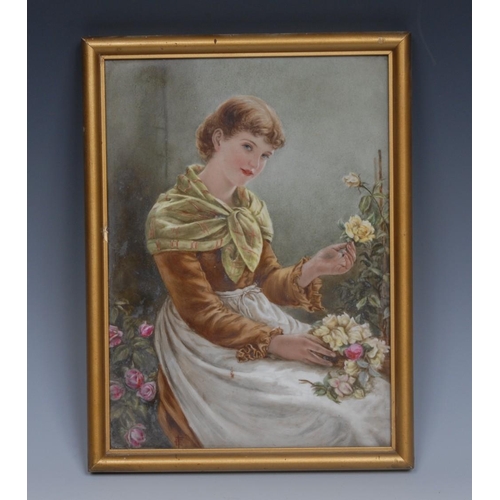 87 - An English porcelain rectangular plaque, painted with a young beauty gathering blooms, labelled to v... 