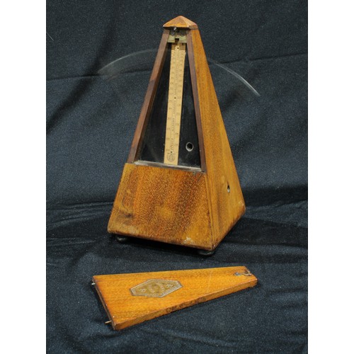 184 - A late 19th century French walnut metronome, c.1900