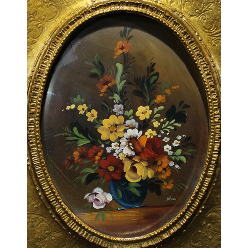 293 - A pair of still life paintings, flowers in vases, oil, indistinctly signed, each 23cm x 17.5cm (2)