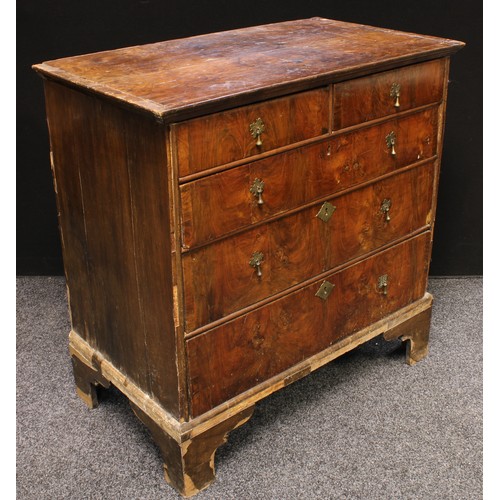 201 - A George II walnut chest of drawers, oversailing rectangular top above two short and three long grad... 