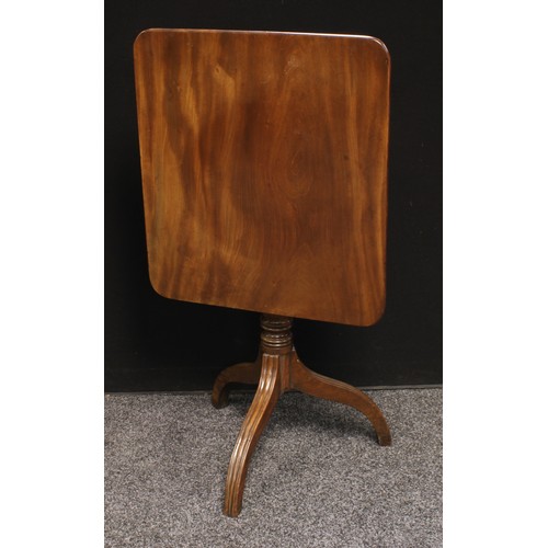 209 - A George III tilt top occasional table, rounded rectangular top, turned column, downswept reeded leg... 