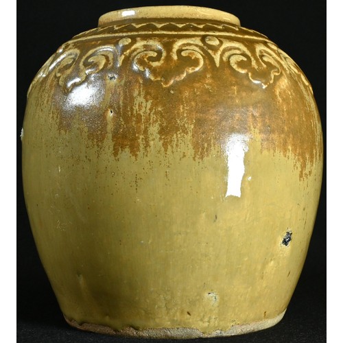 5094 - A Chinese monochrome stoneware ovoid ginger jar, the shoulder moulded with a band of lappets, glazed... 