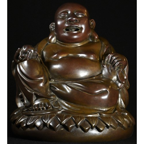 5333 - Chinese School (19th century), a brown patinated bronze, of Budai, seated upon a lotus holding a pea... 