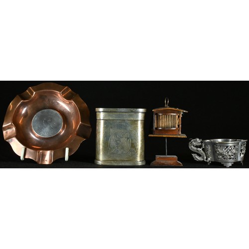 5100 - A Chinese silver Republic Momento dollar, set into a copper ashtray, 11cm diam overall; a Chinese si... 