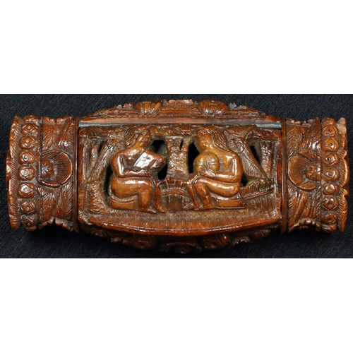 5279 - An early 19th century coquilla nut snuff box, carved with figures, flowers and stiff leaves, hinged ... 