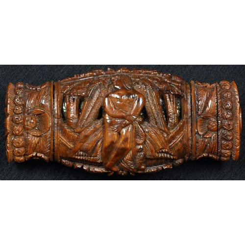 5279 - An early 19th century coquilla nut snuff box, carved with figures, flowers and stiff leaves, hinged ... 