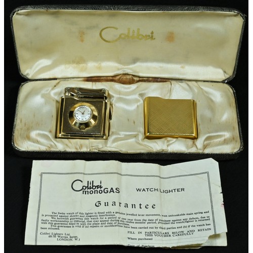 5106 - A Colibri gilt metal novelty combination watch/lighter, monogas mechanism, 4.5cm long, cased with pa... 