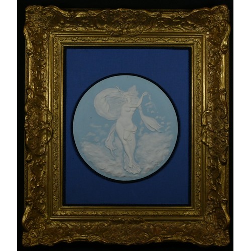 5273 - An Art Nouveau style jasperware roundel, sprigged with a scantily clad ribbon dancer, amongst the cl... 