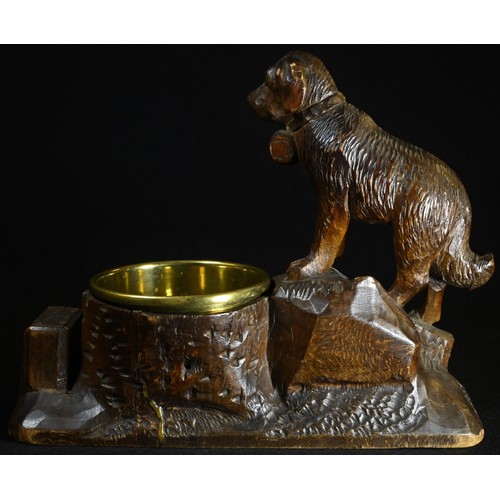 5071 - A Black Forest novelty table vesta, carved with a St Bernard dog, with provision for match box and b... 