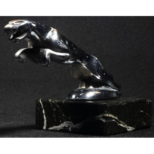 5329 - Automobilia - a Jaguar car mascot, mounted for the desk, square marble base, 13cm long