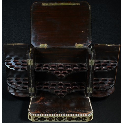 5058 - A 19th century rosewood, boulle and ivory canted rectangular cigar cabinet, profusely inlaid with st... 