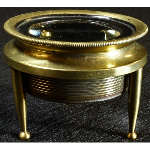 5331 - Cartography - a 19th century lacquered brass tripod map reading lens, 4.5cm diam