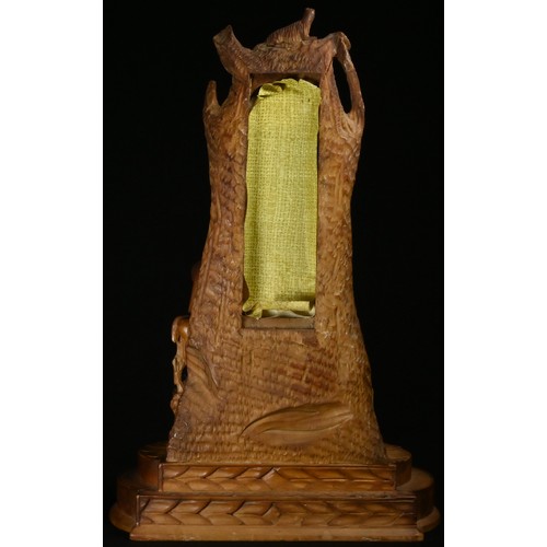 5073 - A Black Forest table top thermometer, carved with a Tyrolean shepherd and his flock, 24cm high, c.19... 