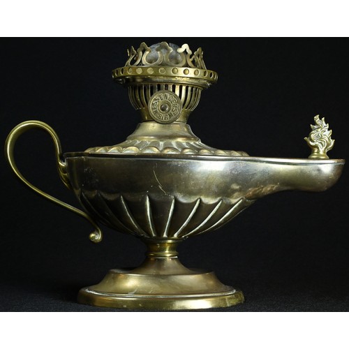 5294 - An Edwardian brass study oil lamp, in the Neo-Classical taste as a Roman lamp, embossed with batwing... 