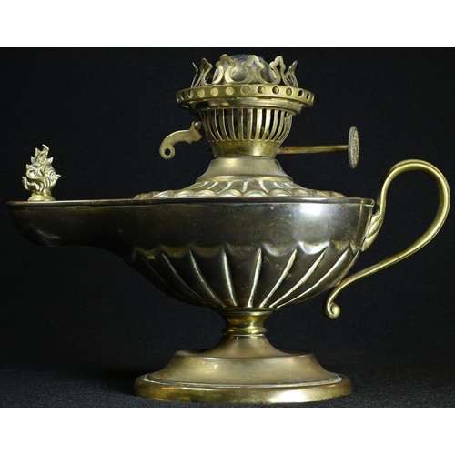 5294 - An Edwardian brass study oil lamp, in the Neo-Classical taste as a Roman lamp, embossed with batwing... 