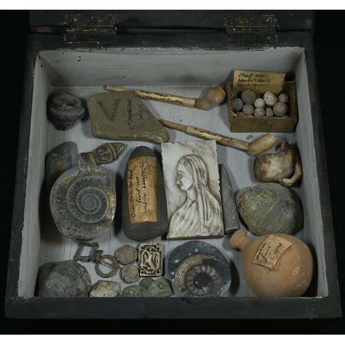 5326 - Antiquities - a table-top wunderkammer, enclosing an arrangement of artefacts, including a Stone Age... 