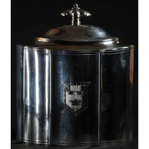 323 - A George III silver commode shaped tea caddy, hinged domed cover with fluted knop finial, outlined t... 