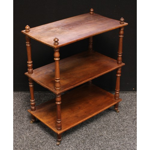 218 - A Victorian oak three tire whatnot/open bookcase, turned supports, Labelled J.Mathews & Sons, Winche... 