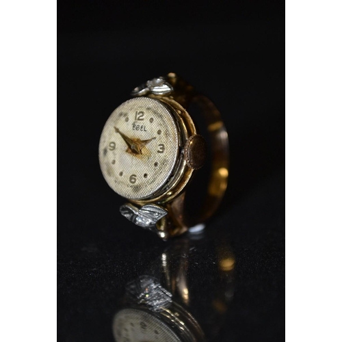 3032 - Ebel - a lady's diamond mounted yellow metal ring watch, circular silvered dial, quartered Arabic nu... 