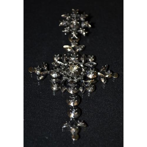 3051 - An unusual 19th century diamond set gold and silver cross pendant, the ornate foliate cross inset wi... 