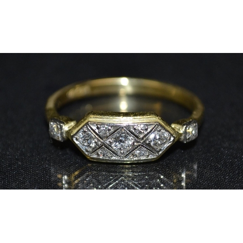 3107 - An Art Deco diamond shaped rectangular nine stone cluster ring, white metal mount set with three cen... 