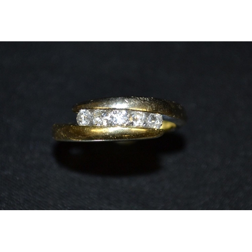 3111 - A diamond five stone ring, five round brilliant cut diamond arranged in a linear formation, between ... 