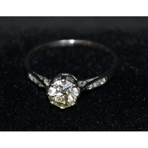 3118 - A diamond solitaire ring, round brilliant cut diamond approx 0.80ct, crown claw set above six stone ... 