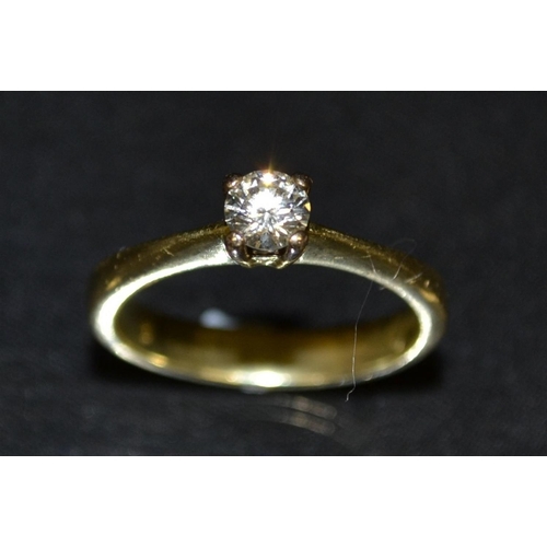 3125 - A diamond solitaire ring, single round brilliant cut diamond approx 0.35ct, quarter claw set, above ... 