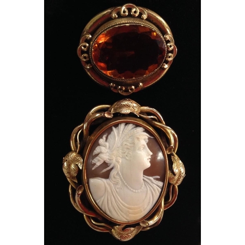 3180 - A Victorian shell cameo brooch, oval panel of a maiden facing right, , glazed aperture verso, within... 