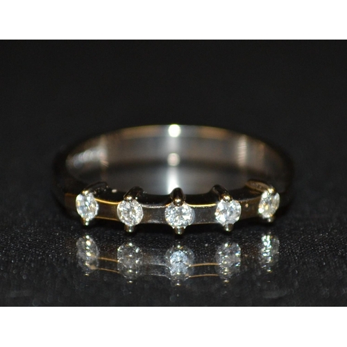 3185 - A new five stone diamond half eternity ring, set with five individual mounted round brilliant cut di... 