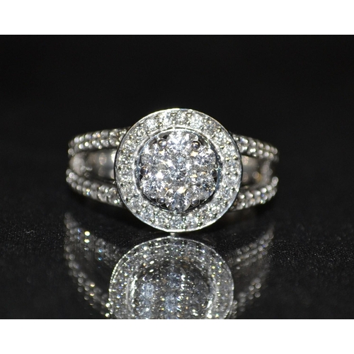 3248 - A new diamond cluster ring, central floral cluster of seven round brilliant cut diamond, surrounded ... 