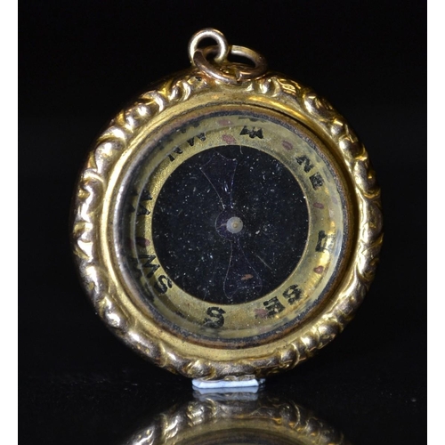 3253 - A 19th century rolled gold cased lady's Chatelaine compass, open double side register, ornate cast f... 