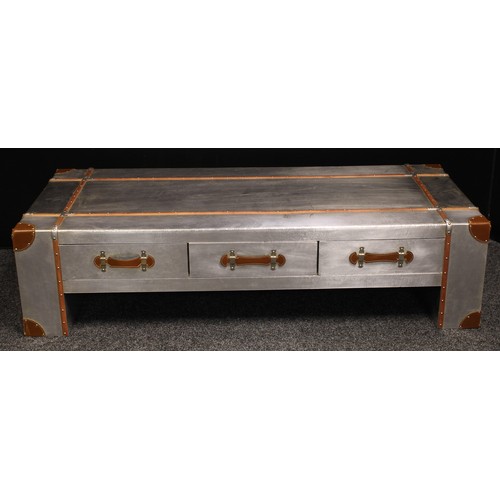 275 - A contemporary coffee table, overlaid with foil, rectangular top above three drawers, further three ... 