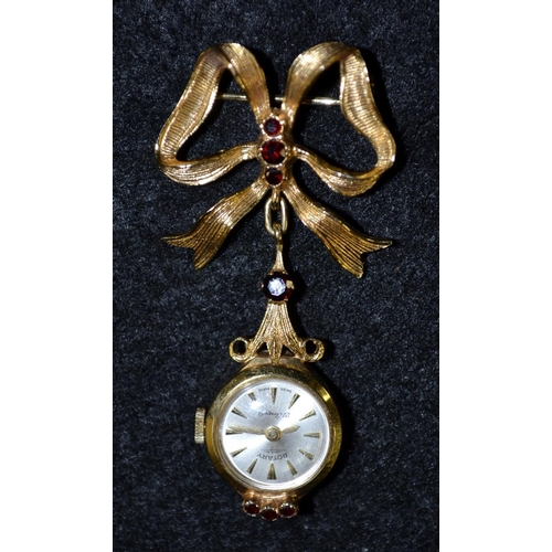 3000A - A 9ct gold garnet set Rotary nurse's fob watch, silvered dial, baton arrows, manual movement, 9ct go... 