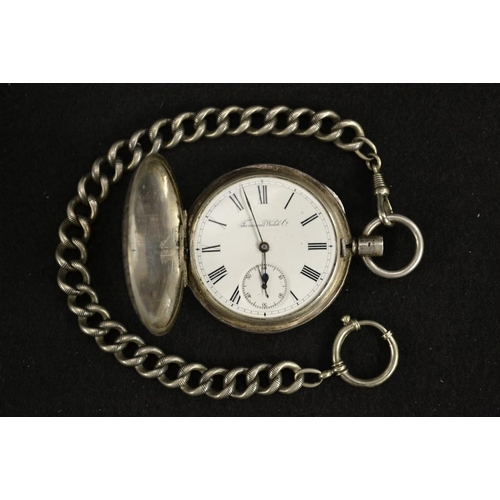 3032 - A Tavannes Watch Co continental silver and Niello full hunter pocket watch and conforming chain, whi... 