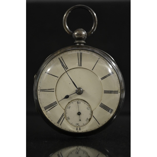 3038 - A Victorian silver open face pocket watch, cream dial, bold Roman numerals, minute track, subsidiary... 