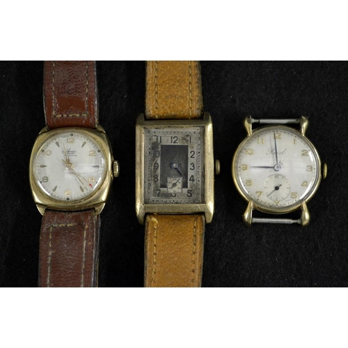 3043 - A 1930's 9ct gold tank watch, silvered dial, Arabic numerals, minute track, subsidiary seconds, indi... 