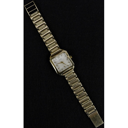 3057 - A Vintage Hefik Incabloc gentleman's 9ct gold canted cased wrist watch, square silvered dial, quarte... 