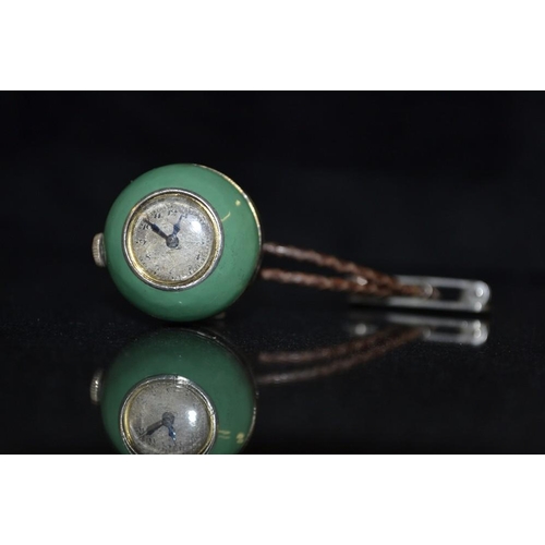 3113 - An Art Deco Green and black enamel globular suspension watch, central black band, between green glob... 