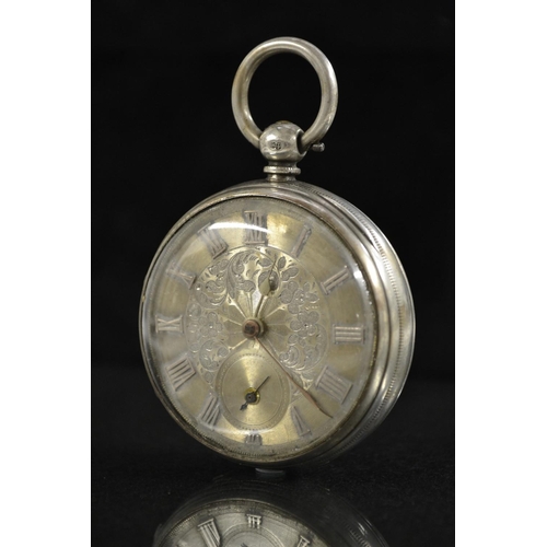 3123 - A Victorian silver open faced pocket watch, engraved silver dial, raised Roman numerals, minute trac... 